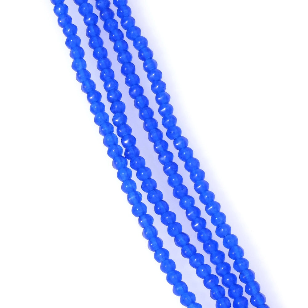 Strand of Bohemian irregular round beads, 4mm, royal blue