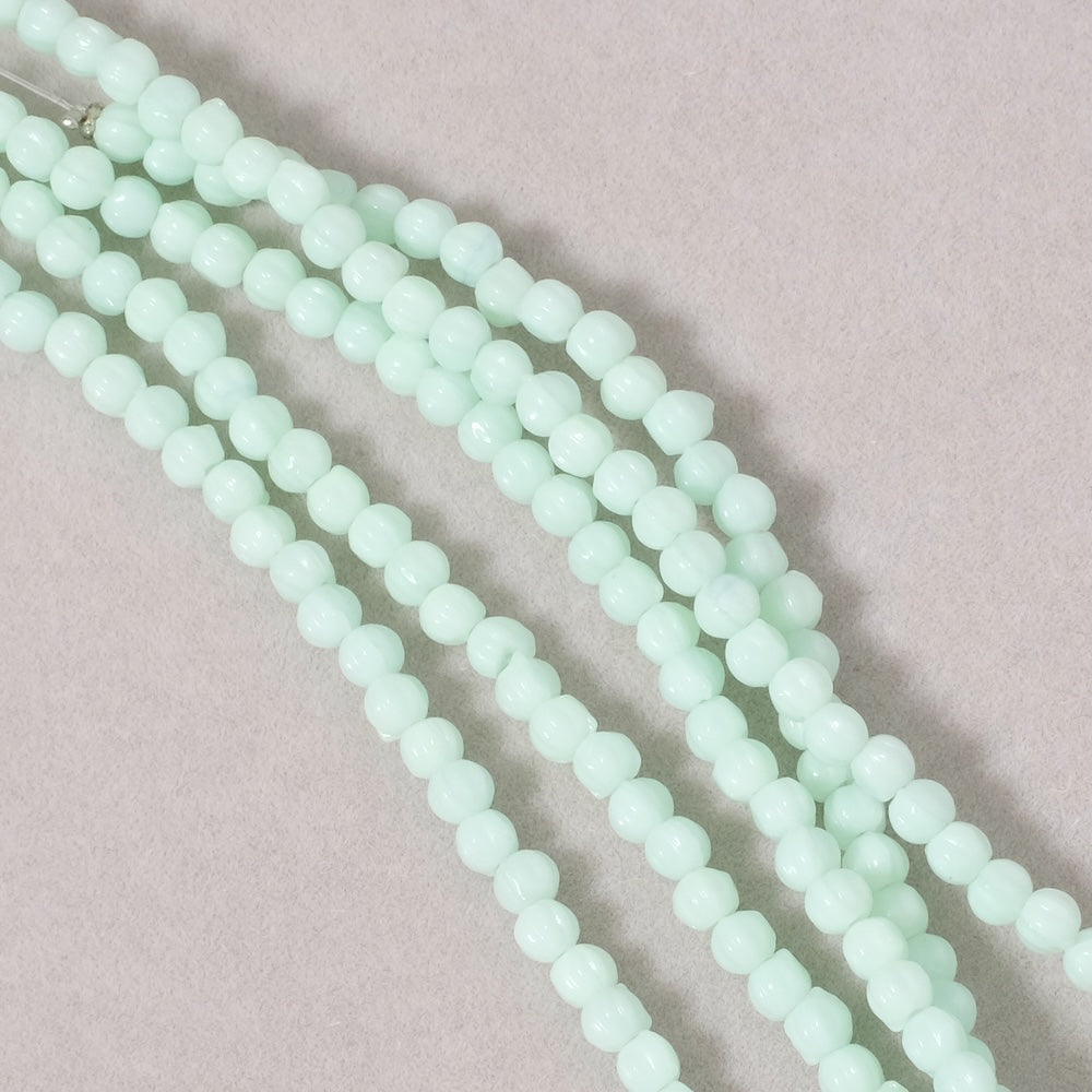Strand of Bohemian striated round beads, 3mm, opaque mint green