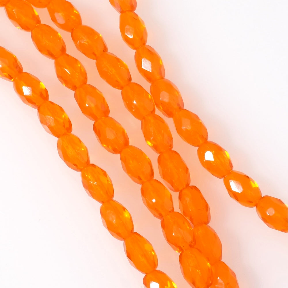 Strand of Bohemian faceted olive beads, 9x6mm, transparent orange