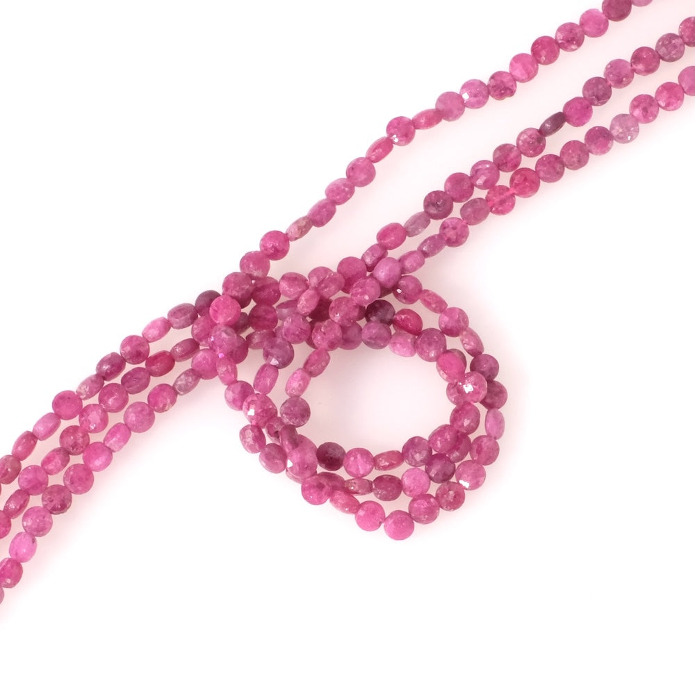 Strand of 4mm faceted round, flattened natural Ruby beads