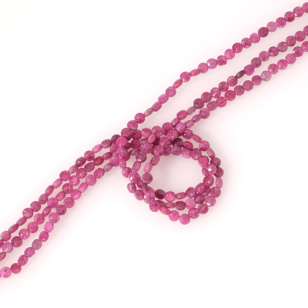 Strand of 4mm faceted round, flattened natural Ruby beads