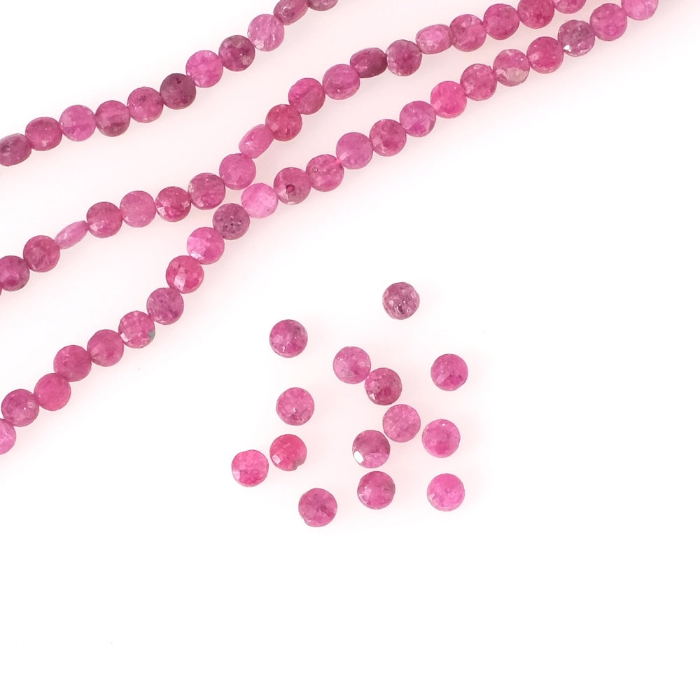 Strand of 4mm faceted round, flattened natural Ruby beads