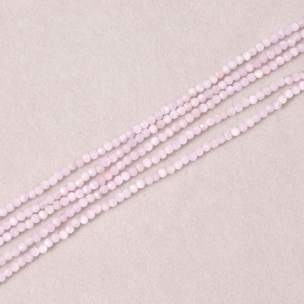 Strand of 2mm faceted round natural Kunzite beads