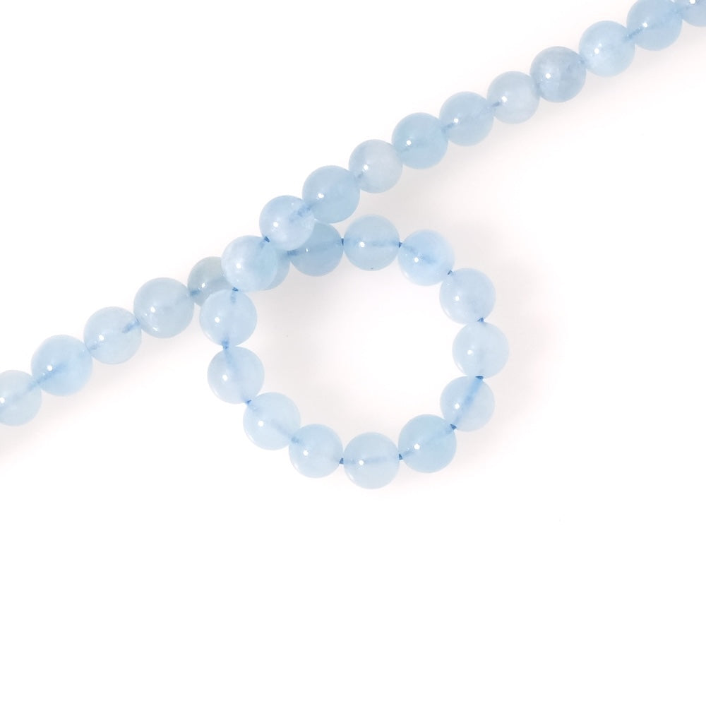 Strand of natural round 6mm beads in Aquamarine