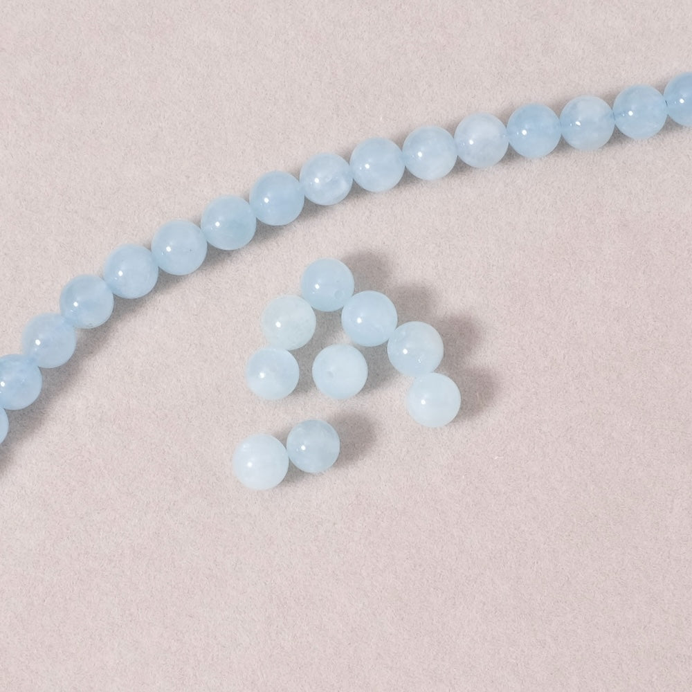 Strand of natural round 6mm beads in Aquamarine