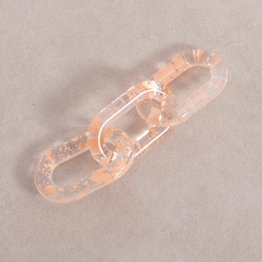 4 oval links 27mm in transparent pink speckled acetate