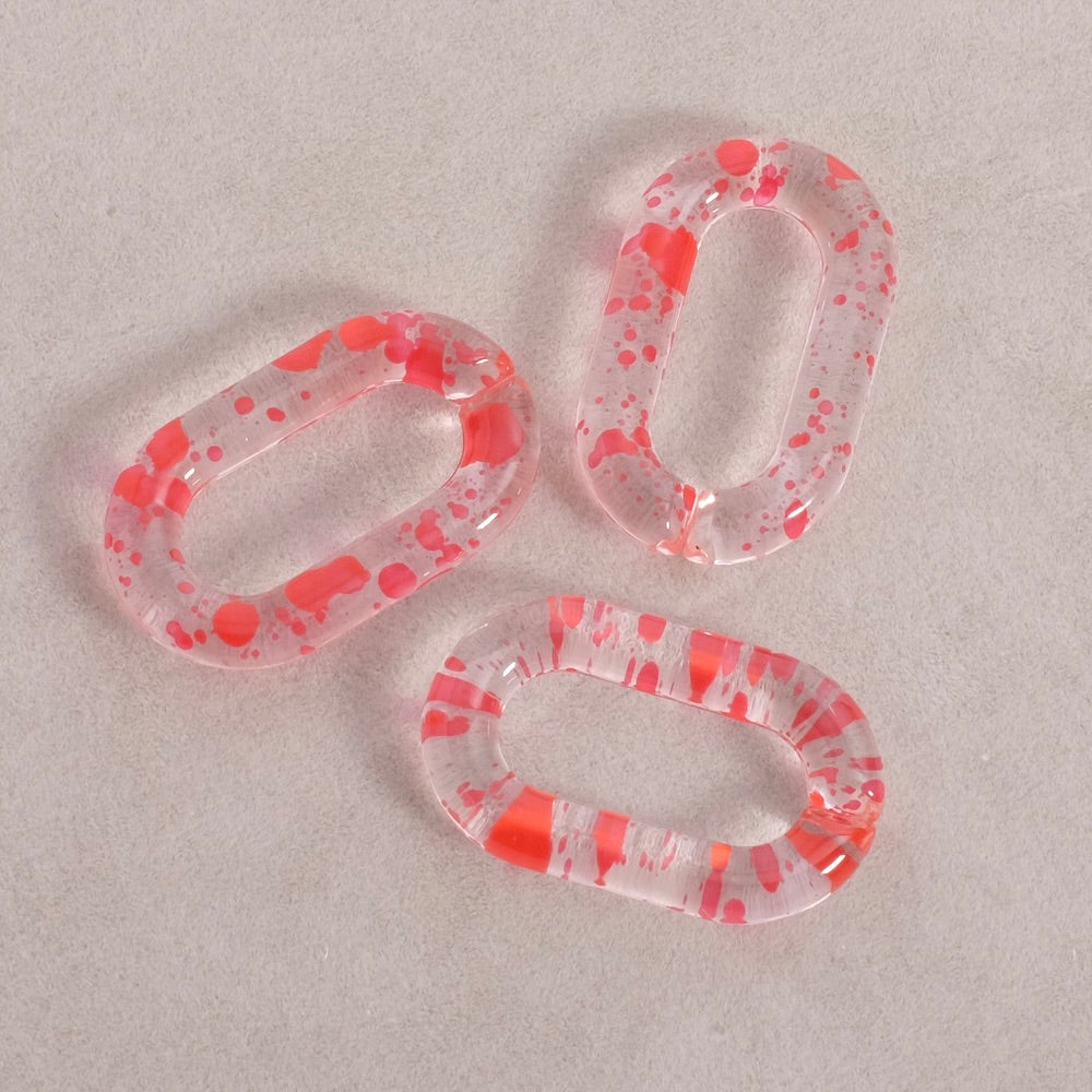 4 oval links 27mm in transparent red speckled acetate