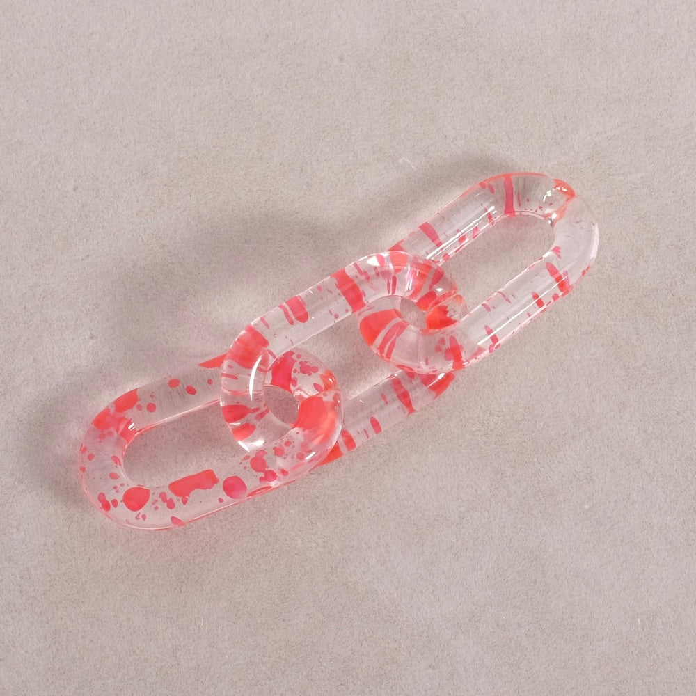 4 oval links 27mm in transparent red speckled acetate