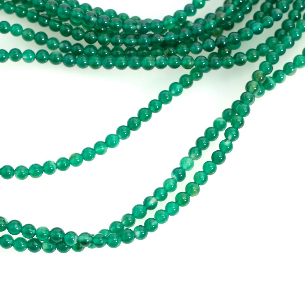 Strand of 4mm round beads in green Onyx natural stone