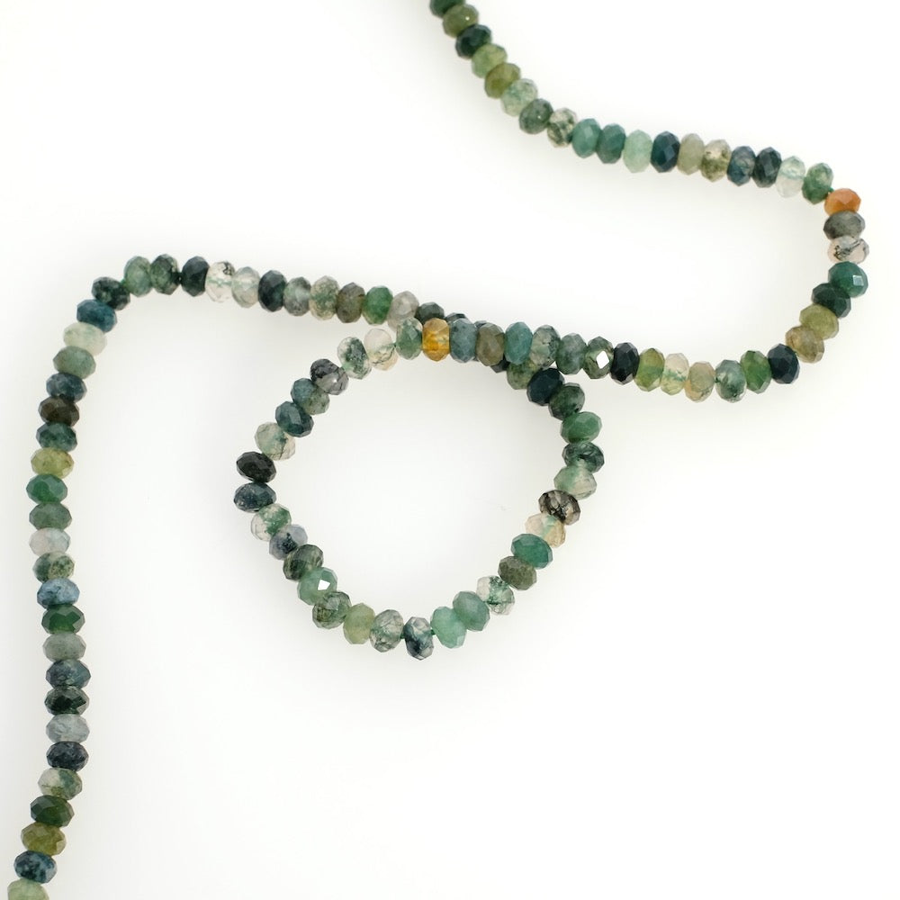 Strand of natural 4mm faceted doughnut beads in Moss Agate