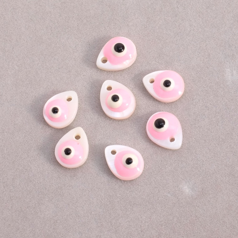 2 Mother-of-pearl and pink enamelled eye drop pendants