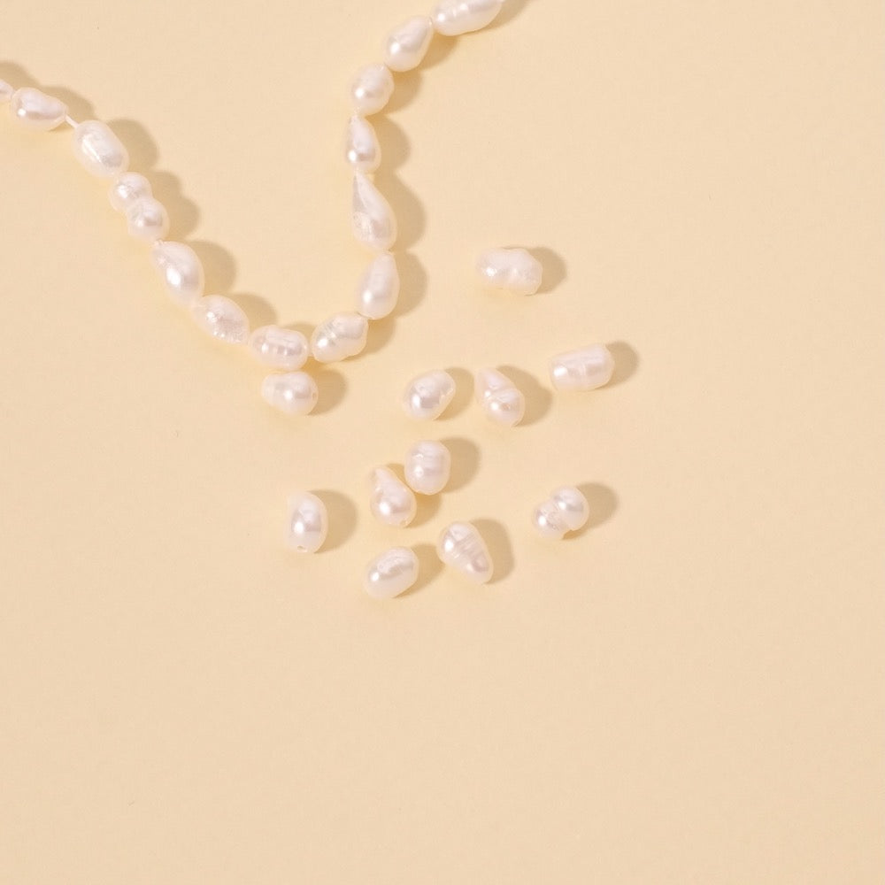 10 irregular 6mm oval natural mother-of-pearl beads