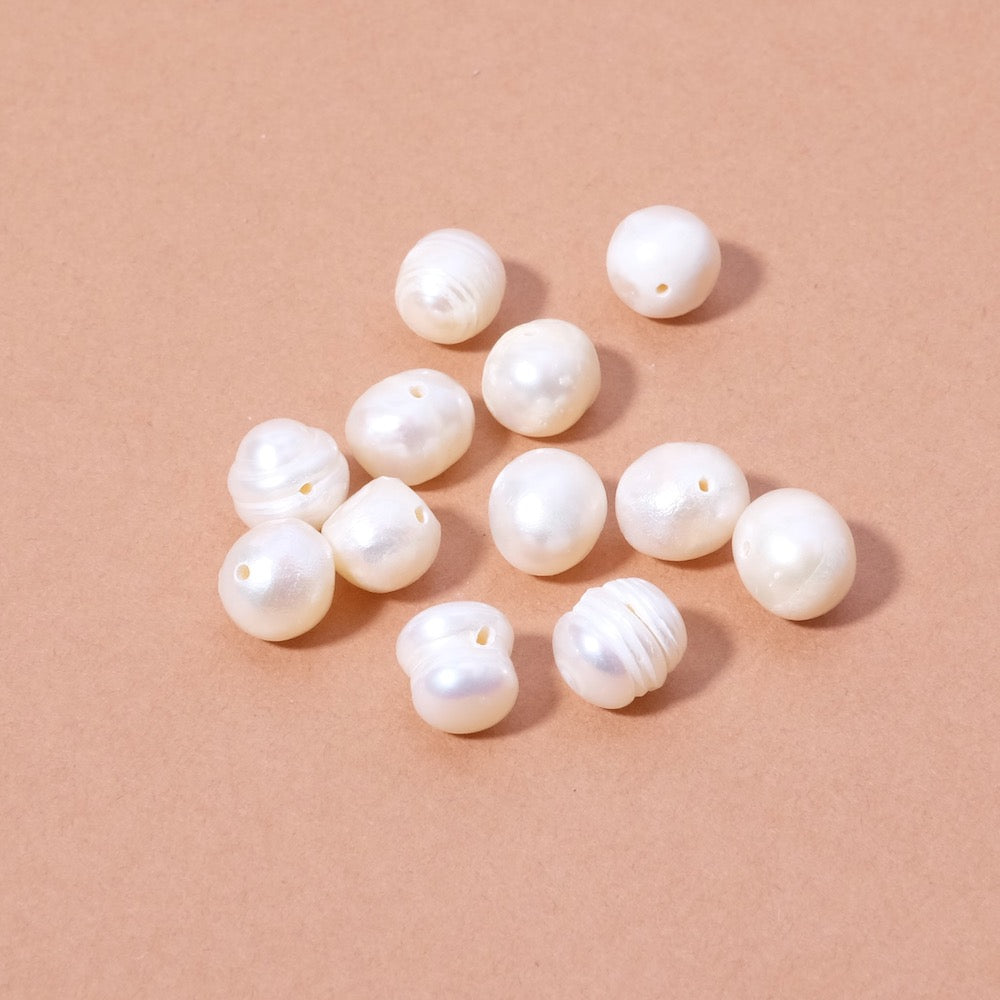10 irregular oval natural mother-of-pearl beads