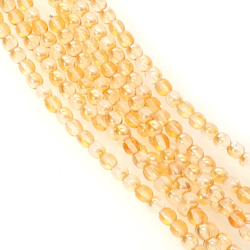 Strand of transparent iridescent yellow 5mm round Bohemian beads