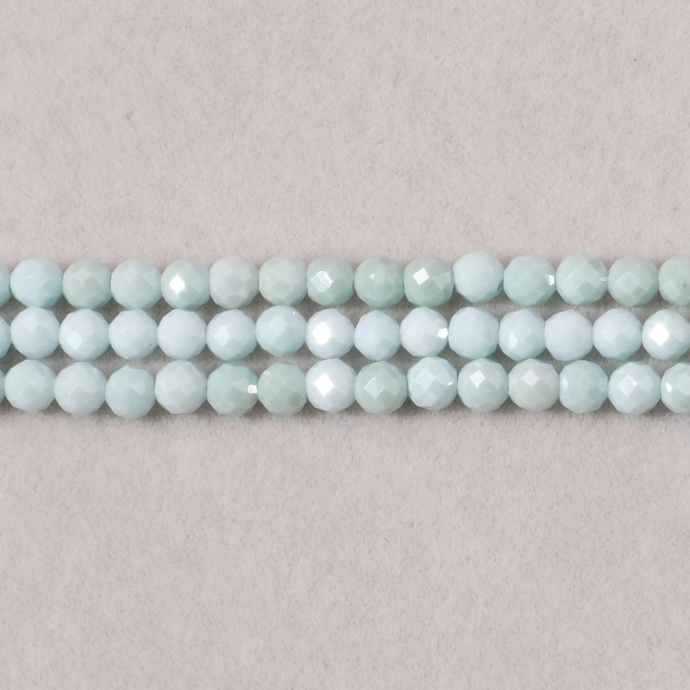 Strand of 3.4mm faceted round beads in Pastel Green Zirconium Oxide or Cubic Zirconia