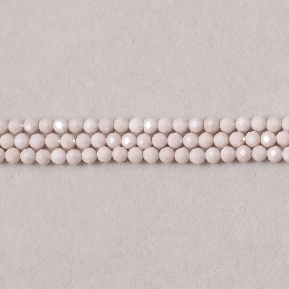 Strand of 3mm faceted round beads in Beige Zirconium Oxide or Cubic Zirconia
