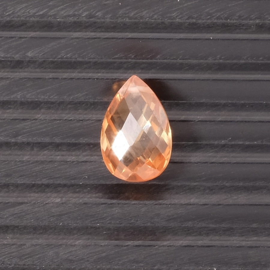 Faceted teardrop bead, 15 x 10mm in Peach Cubic Zirconia