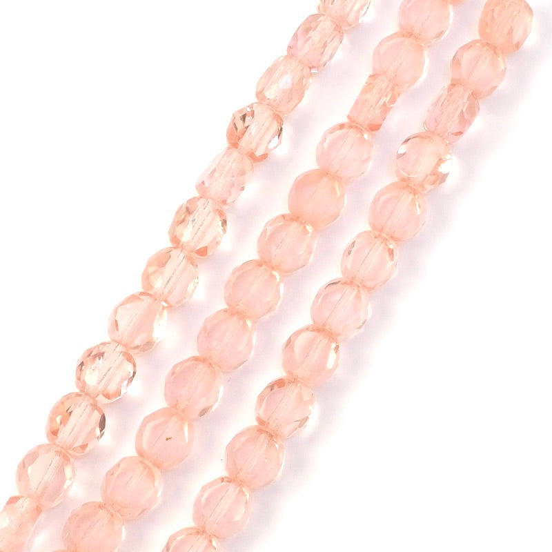 Strand of round, flattened, faceted 8mm transparent peach Bohemian beads