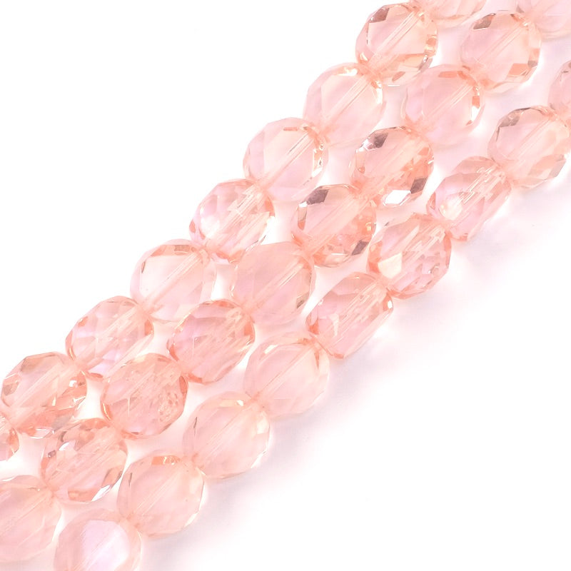 Strand of round flattened faceted 10mm transparent peach Bohemian beads