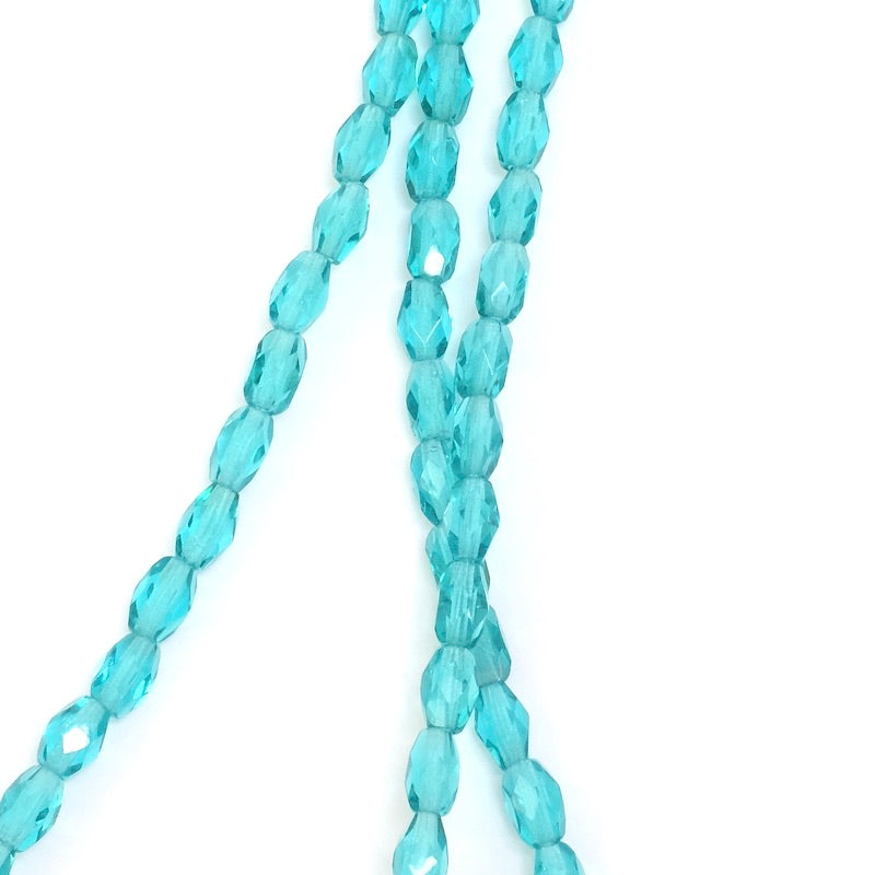 Strand of Bohemian Olives faceted beads 6x4mm turquoise blue transparent