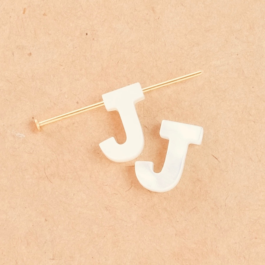 Pearl letter J in natural mother-of-pearl