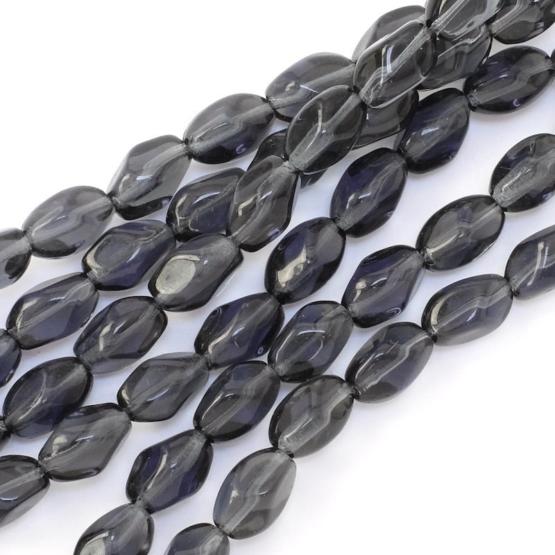 Strand of twisted oval Bohemian glass beads, 11x7mm, black