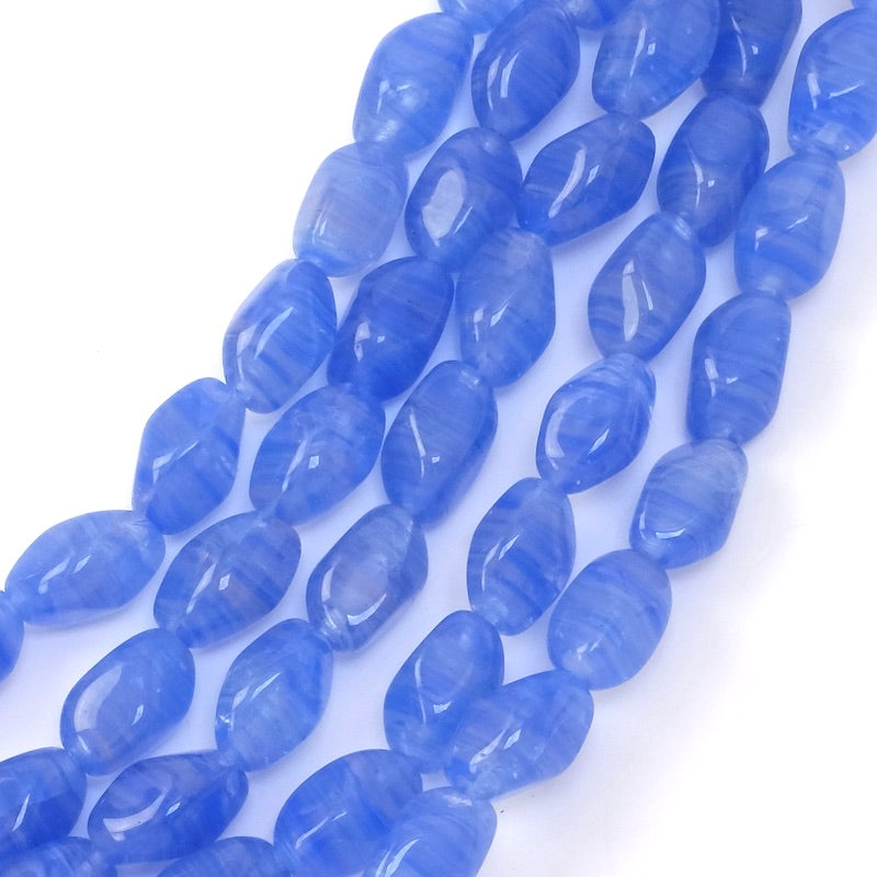 Strand of oval twisted Bohemian beads 11x7mm blue