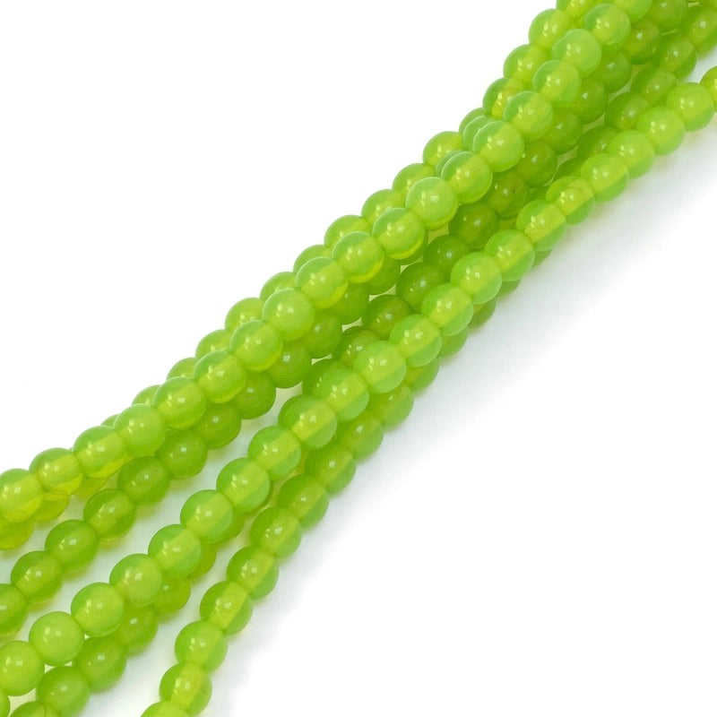 Strand of light green 4mm round Bohemian beads