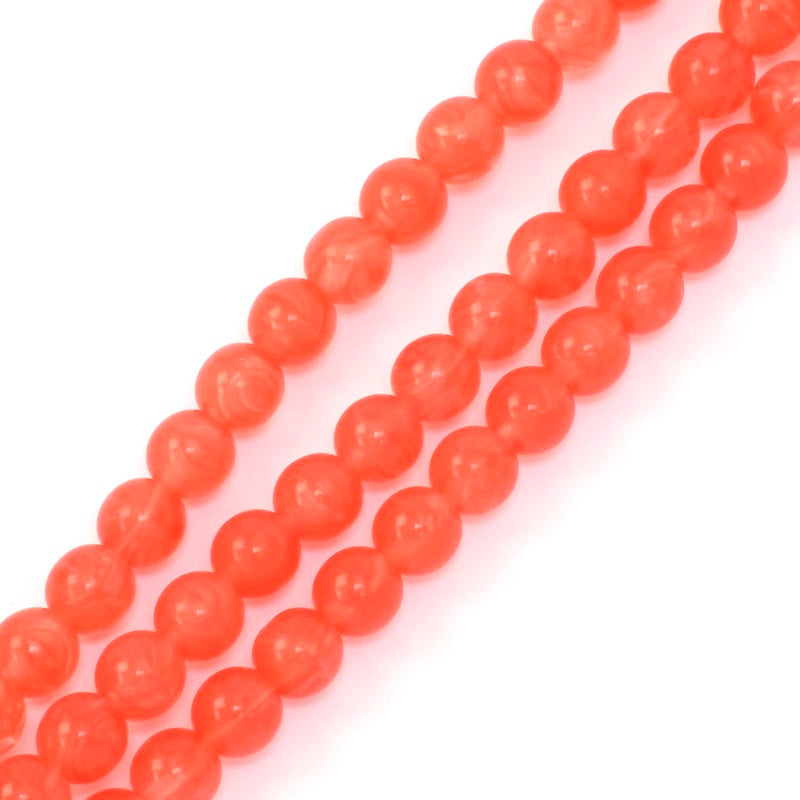 Strand of 6mm round orange Bohemian beads