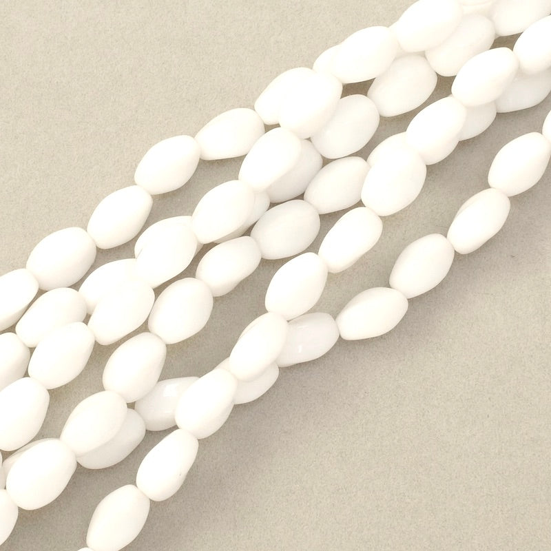Strand of twisted oval Bohemian glass beads, 9x6mm, white