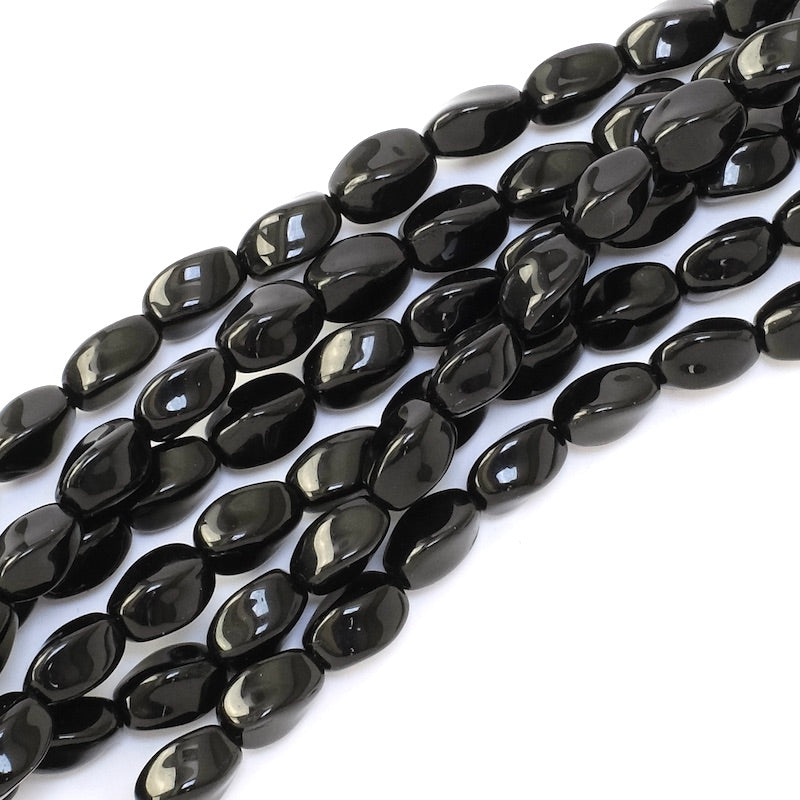 Strand of twisted oval Bohemian glass beads, 9x6mm, black
