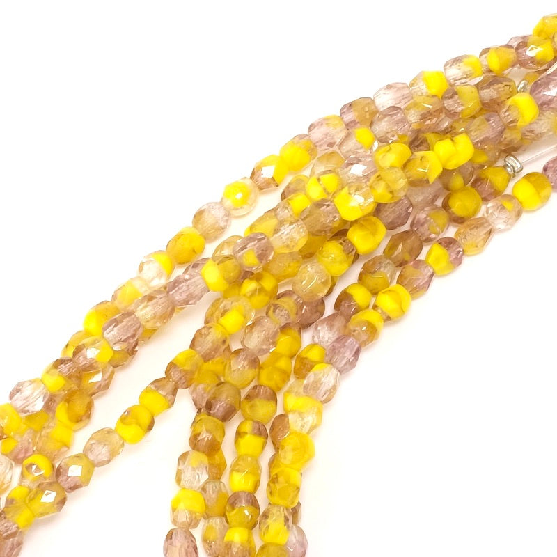 Strand of 4 mm round faceted Bohemian pearls in shades of yellow and violet