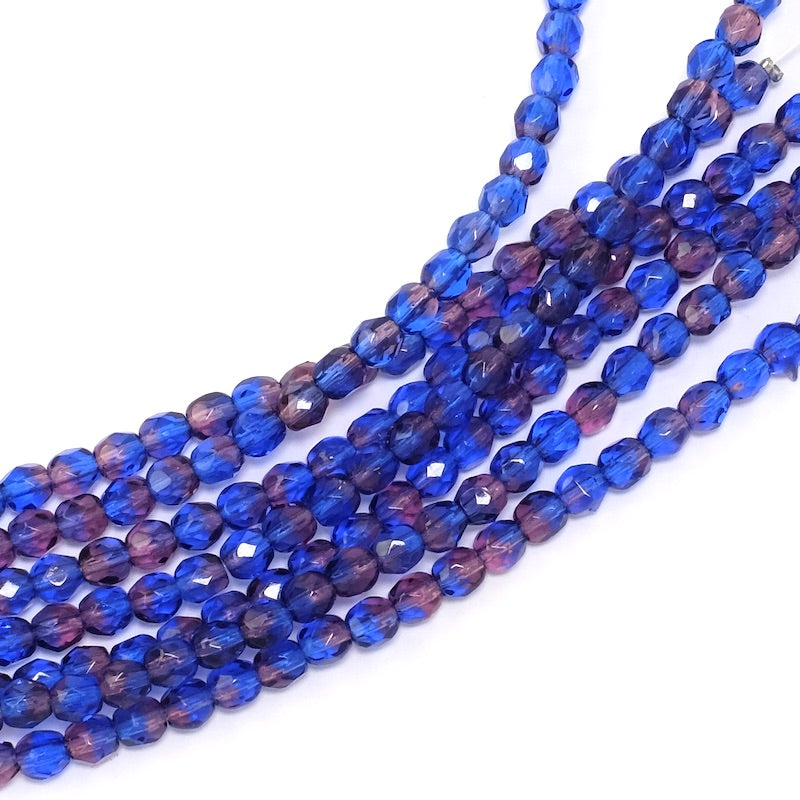 Strand of 4 mm round faceted Bohemian beads in shades of blue and dark purple
