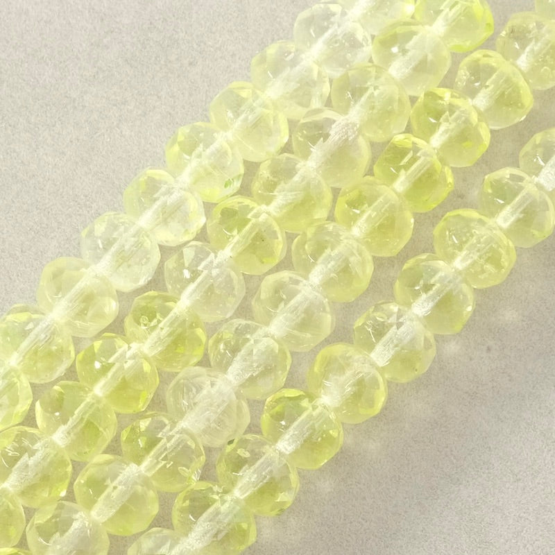 Strand of faceted Bohemian beads 6x8mm light yellow
