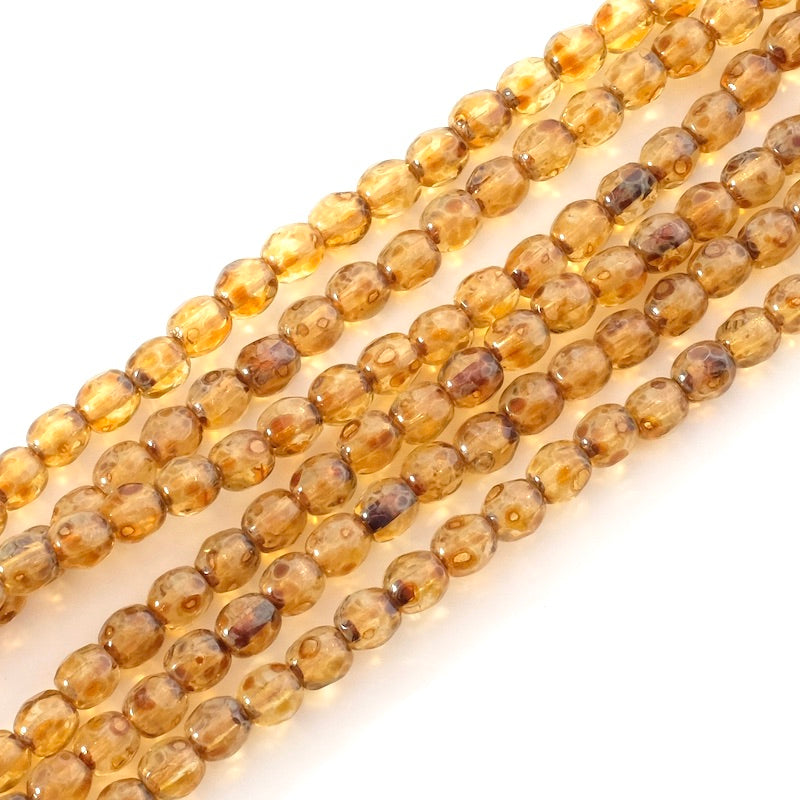 Strand of 4 mm round faceted Bohemian pearls in shades of brown