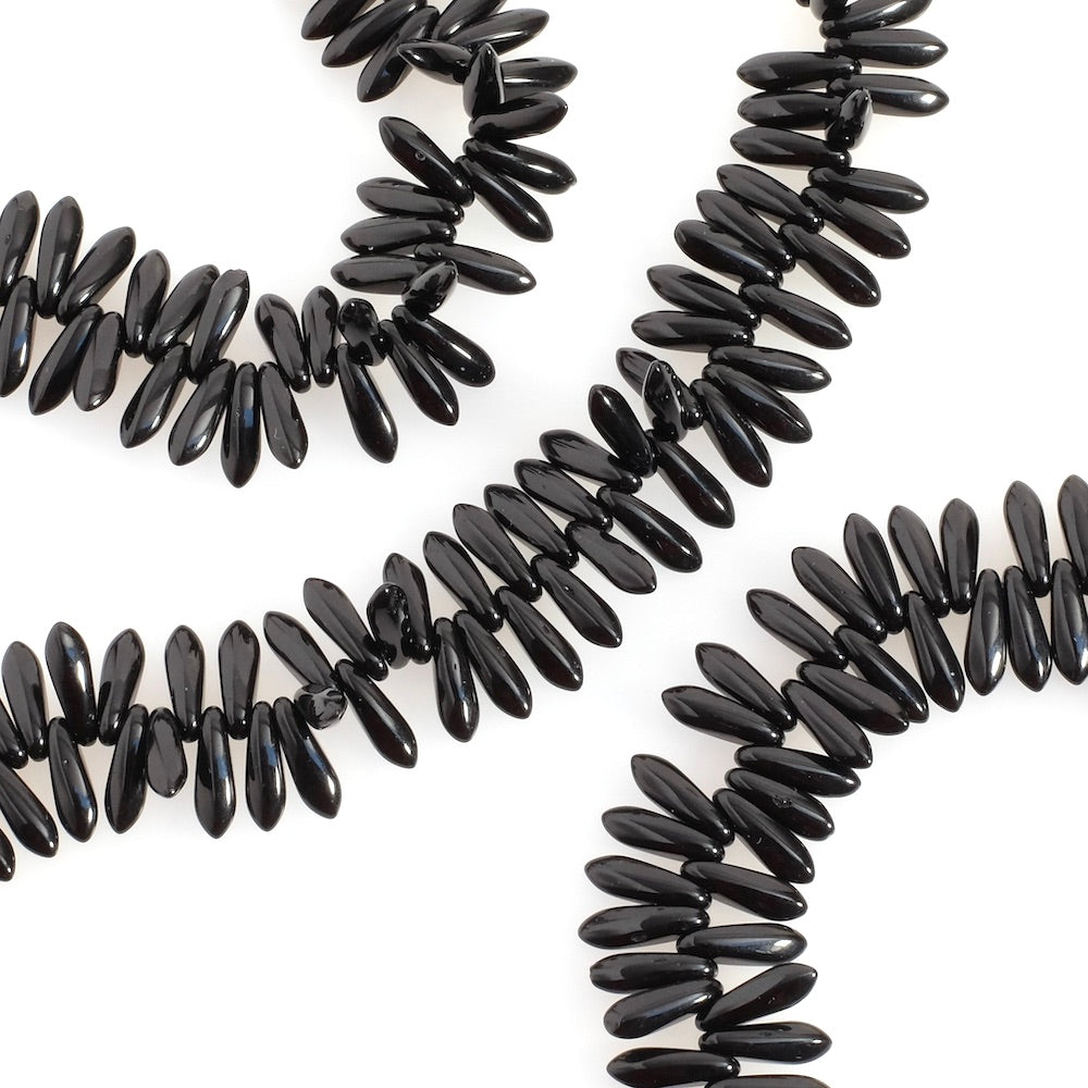 Strand of Bohemian beads Black spikes 3x11mm