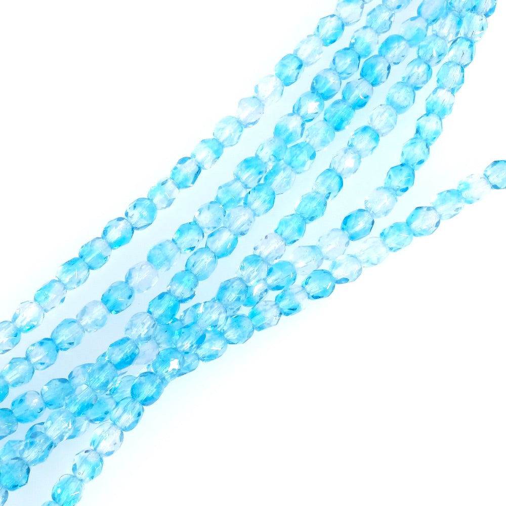 Strand of round faceted Bohemian beads 4 mm transparent blue