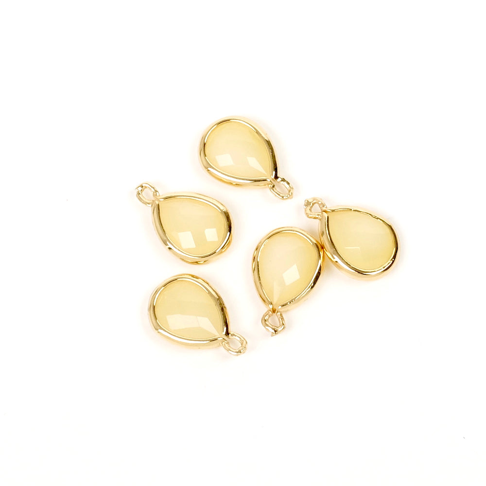 2 Faceted Drop Pendants in Opaque Pastel Yellow Glass and Gold Plated Metal