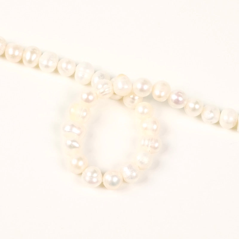 Strand of irregular 5/6mm natural Mother-of-Pearl beads