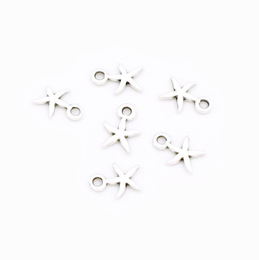 Set of 4 silver-plated zamak starfish pendants