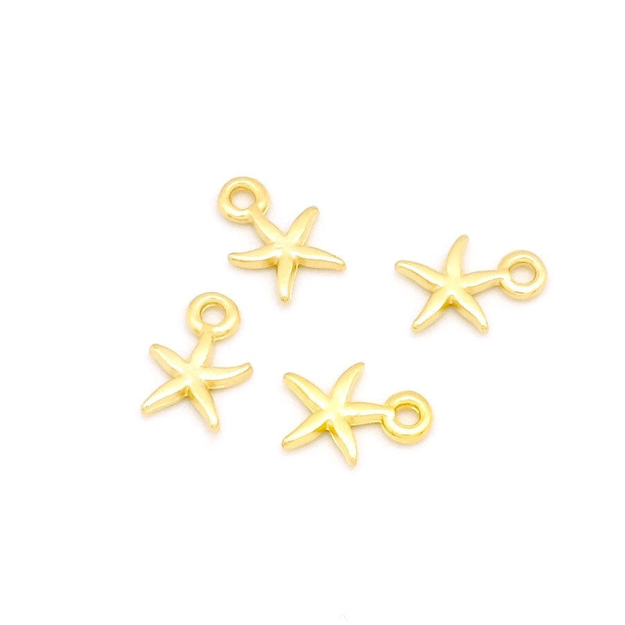 Set of 4 24K gold-plated zamak starfish pendants