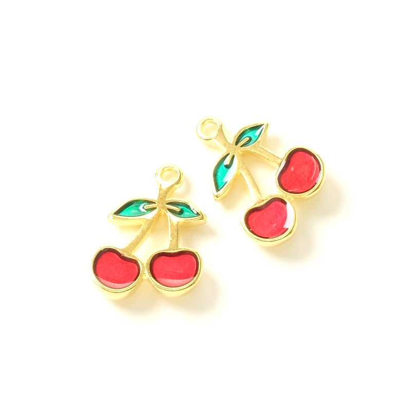Enameled cherry pendant in 24K gold-plated Zamak