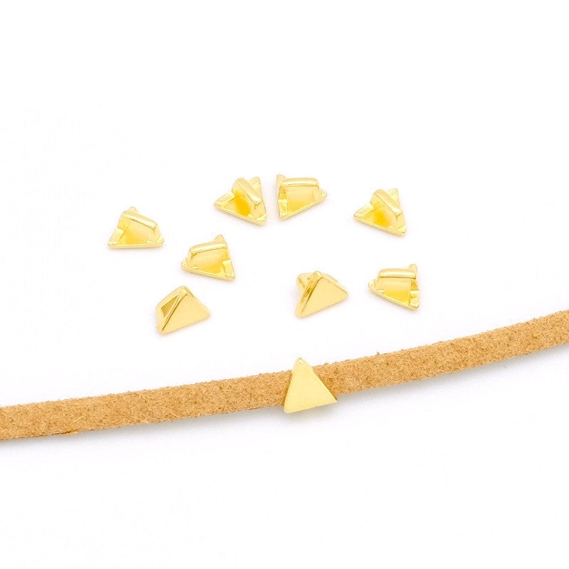 Set of 4 geometric triangle sliders in gold-plated zamak