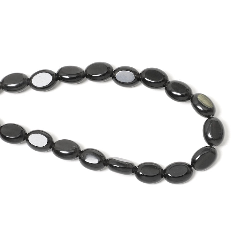 38cm strand of 6x8mm oval black Onyx beads
