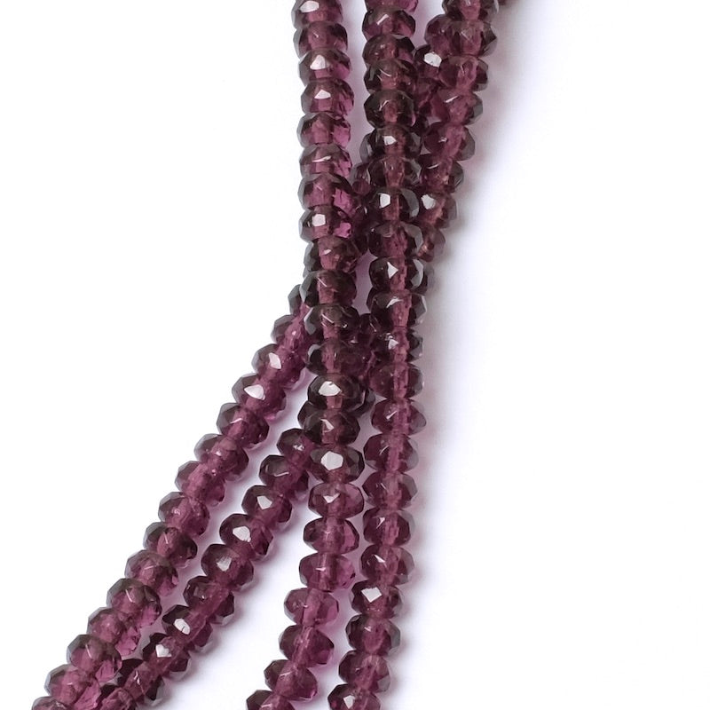Strand of transparent violet faceted Bohemian beads 2x4mm