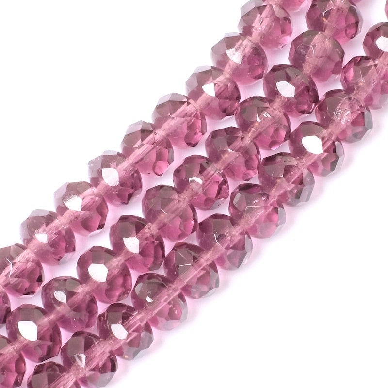 Strand of faceted Bohemian pearls Violine transparent 6x8mm