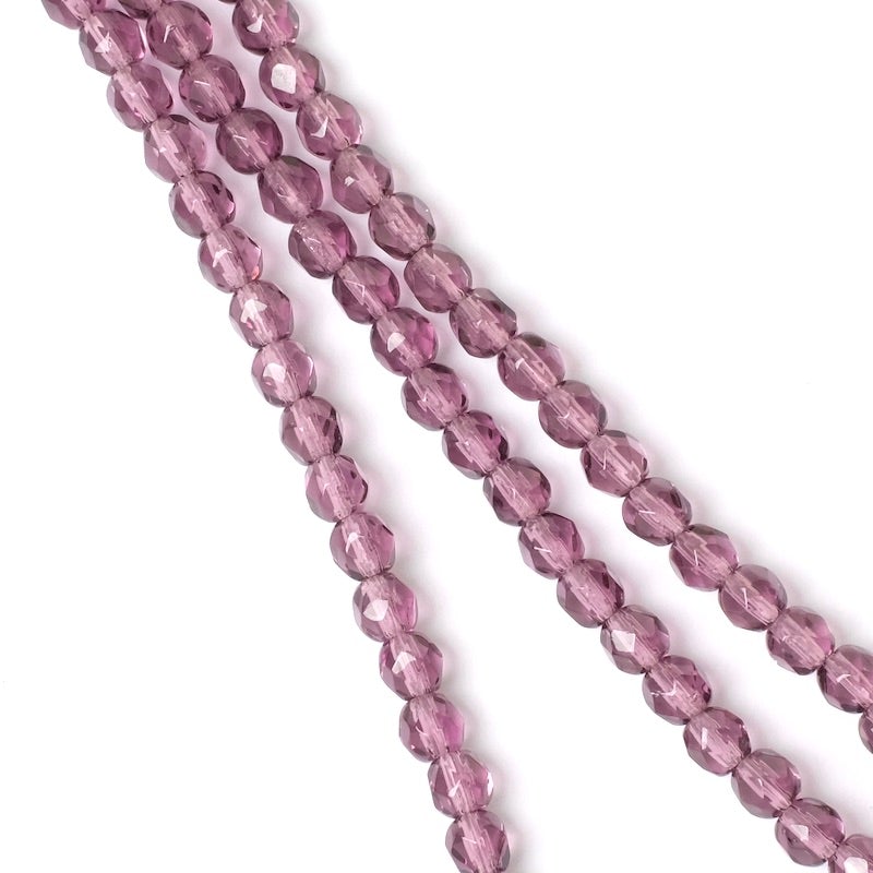 Strand of round faceted Bohemian beads Lie de vin transparent 4mm