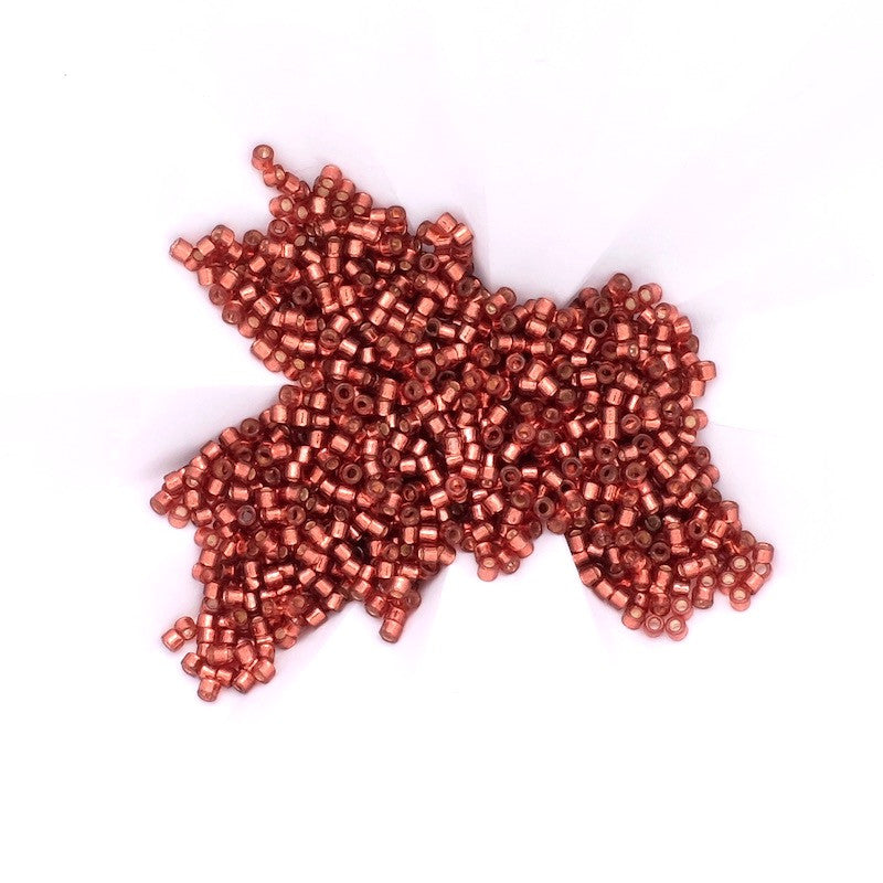 8 grams of Miyuki Délica 11/0 Duracoat S/L Dyed Magenta N°2160 beads