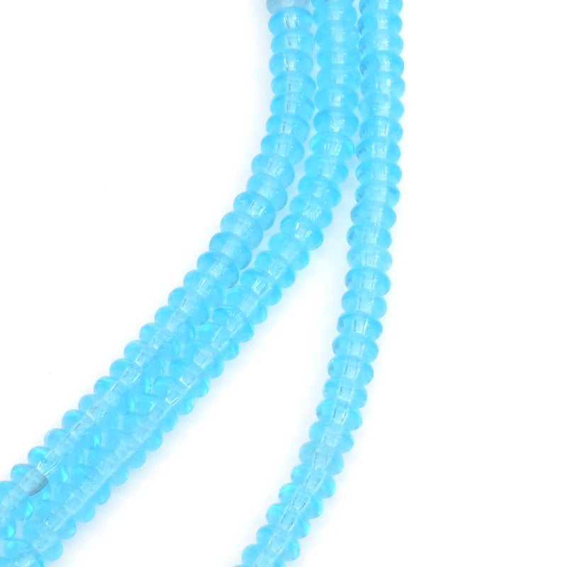 Strand of transparent blue Donuts Bohemian beads 2x4mm