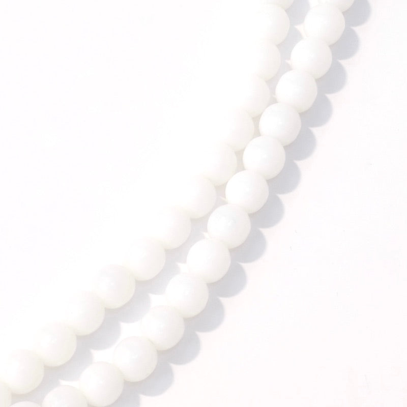 Strand of 6mm round white opaque Bohemian pearls